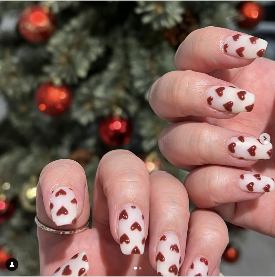 Bright red Valentines Day nails with a glossy finish, perfect for a timeless romantic look